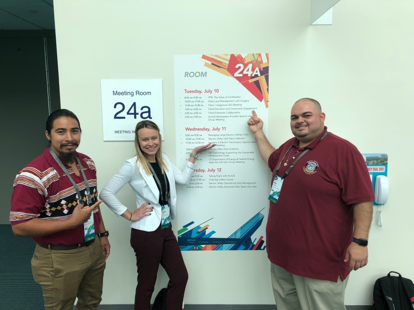 Quenton, Lacee and Juan (L to R) in front of the Tribal Session at the 2018 Esri User Conference